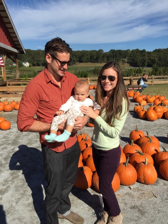 Family at Pumpkin Patch Baby's First Fall