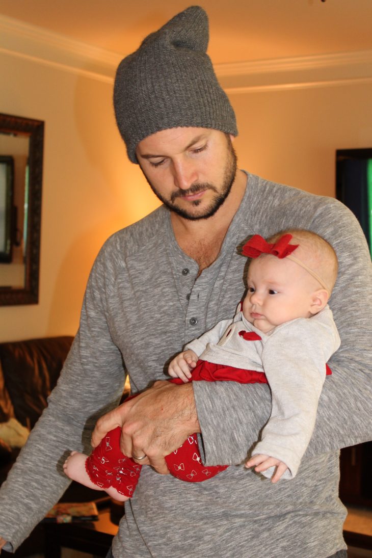 Daddy and Ailey in first Christmas outfit