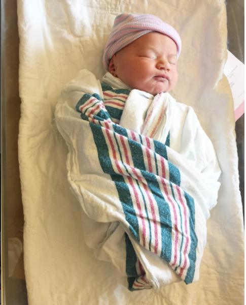 newborn baby in hospital blanket sloane