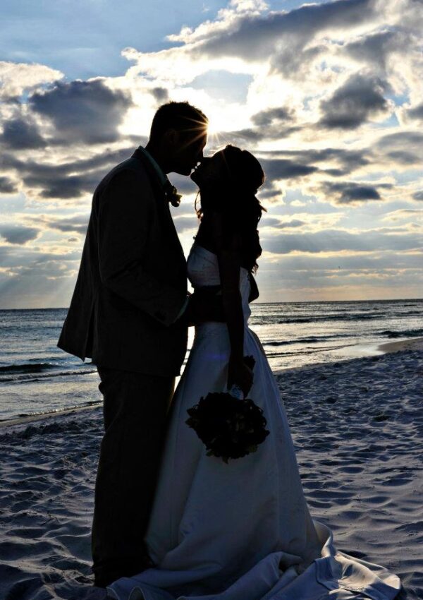 Wedding beach photo kiss sunlight