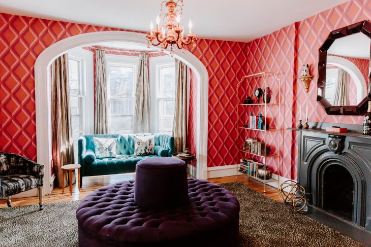 Pink room with purple and teal furniture