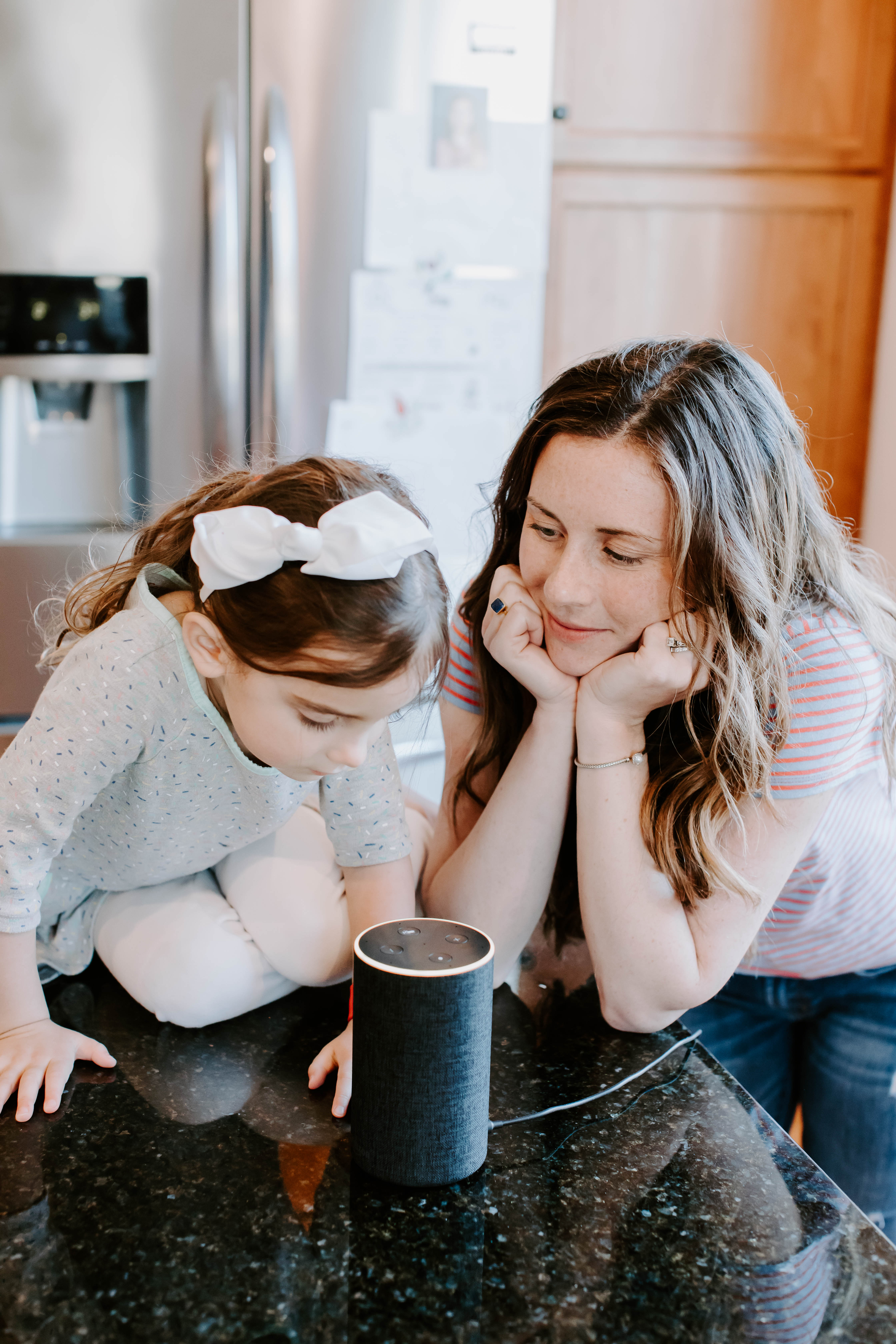 Mom and Daughter using Amazon Echo