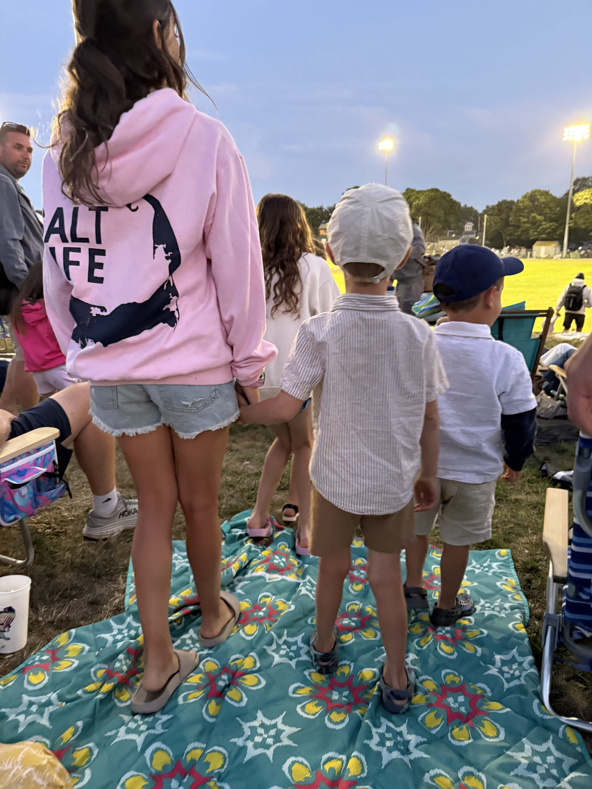 Chatham Anglers Game Little Kids Watching from hill