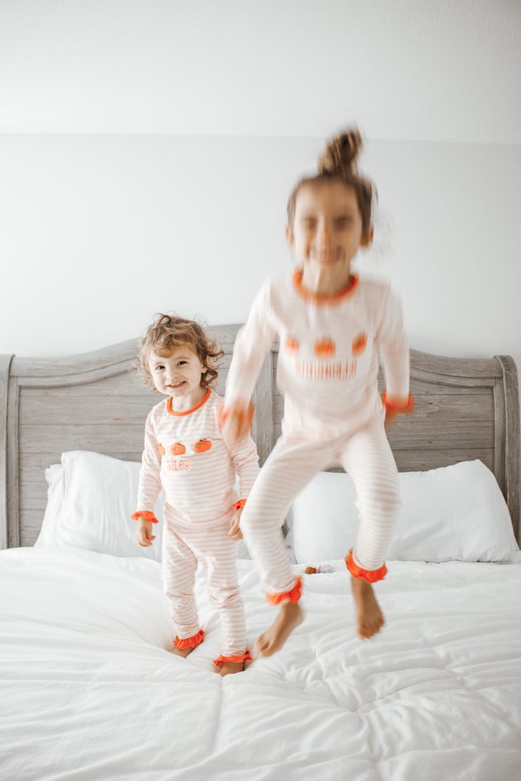Sisters Jumping on the Bed