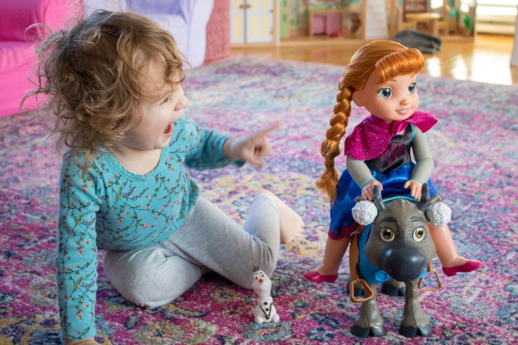 Little Girl with Disney's Frozen Toddler Anna & Sven Set