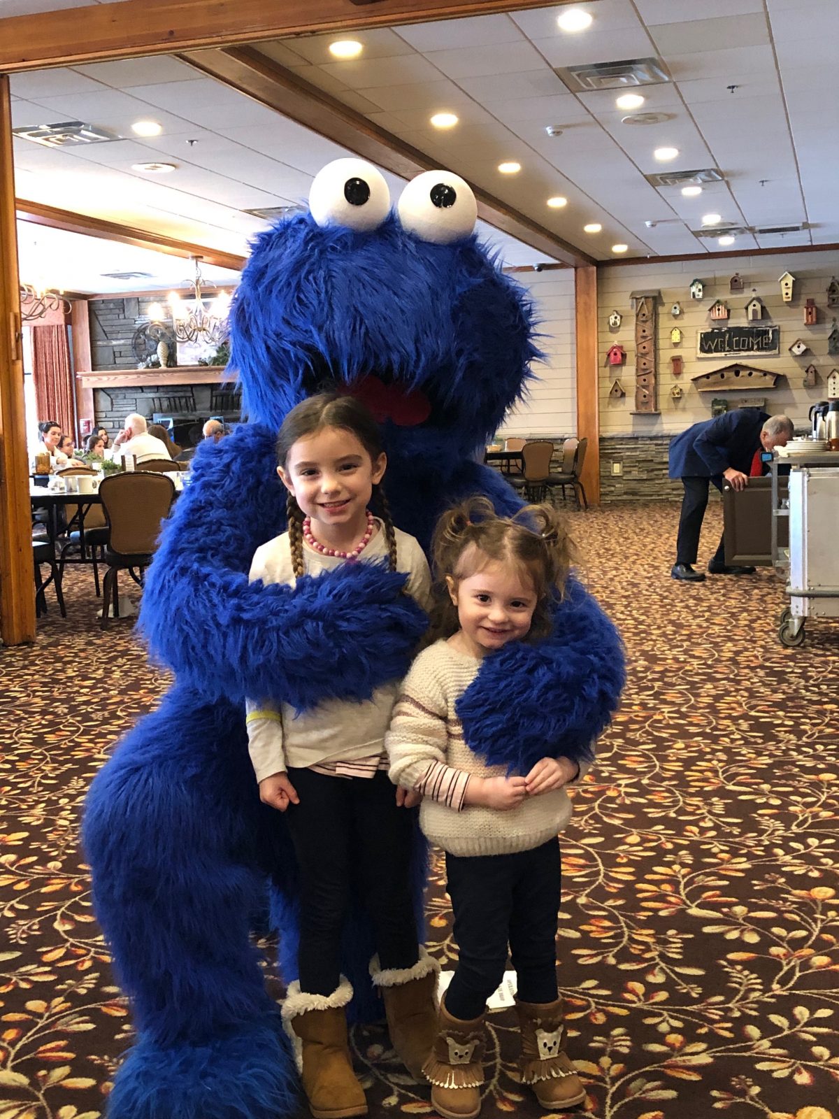 Little girls with Cookie Monster in the Dining Room at Woodloch Pines Resort