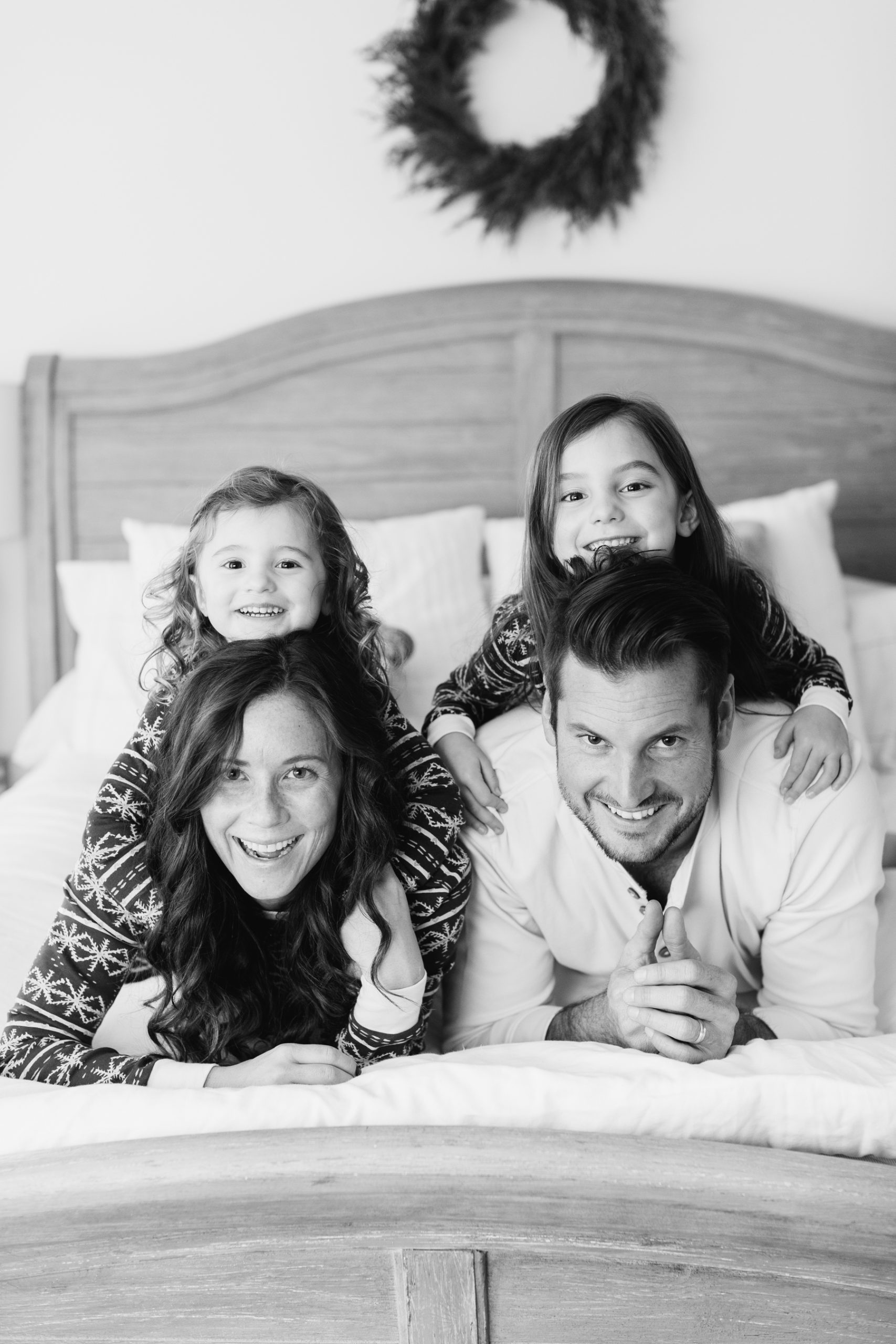 family of four photo smiling about life