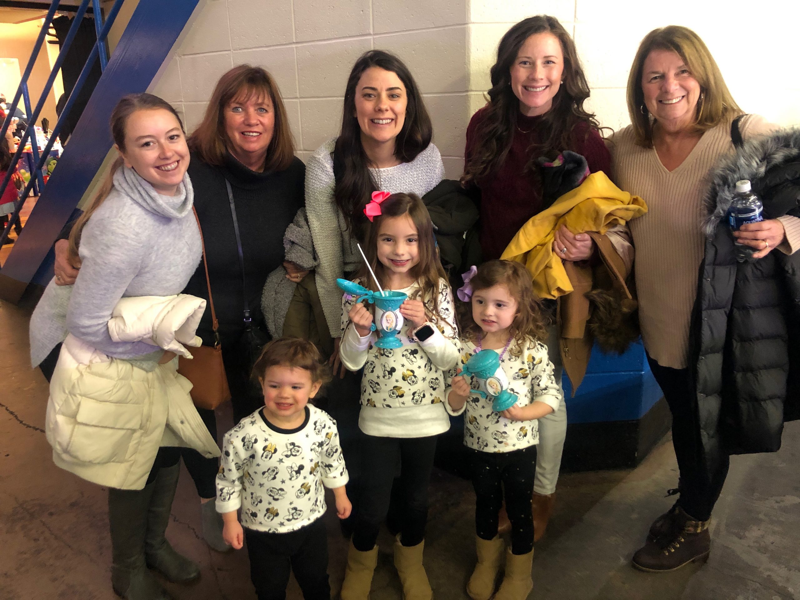 Group of Ladies from toddler to Grandma at disney on ice