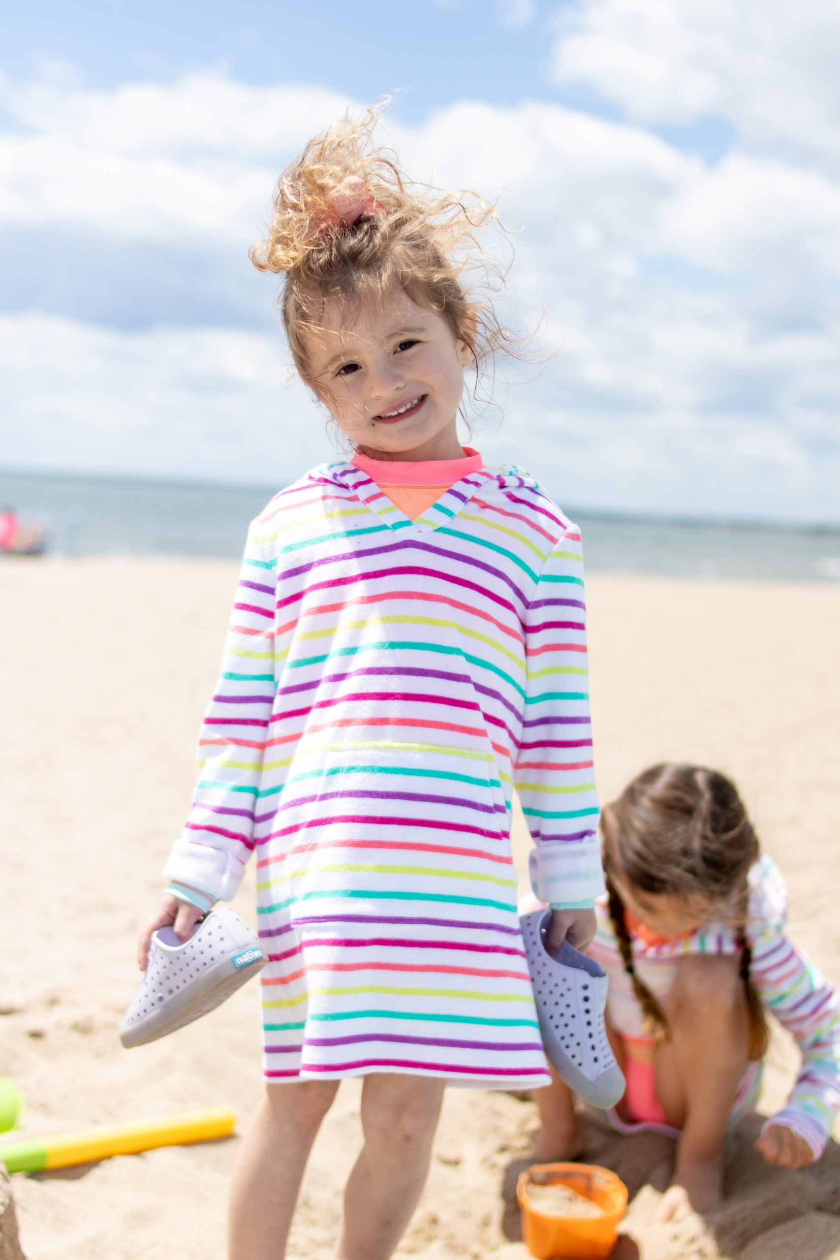 little girl in lands end coverup on beach in Connecticut - Meigs Point Beach