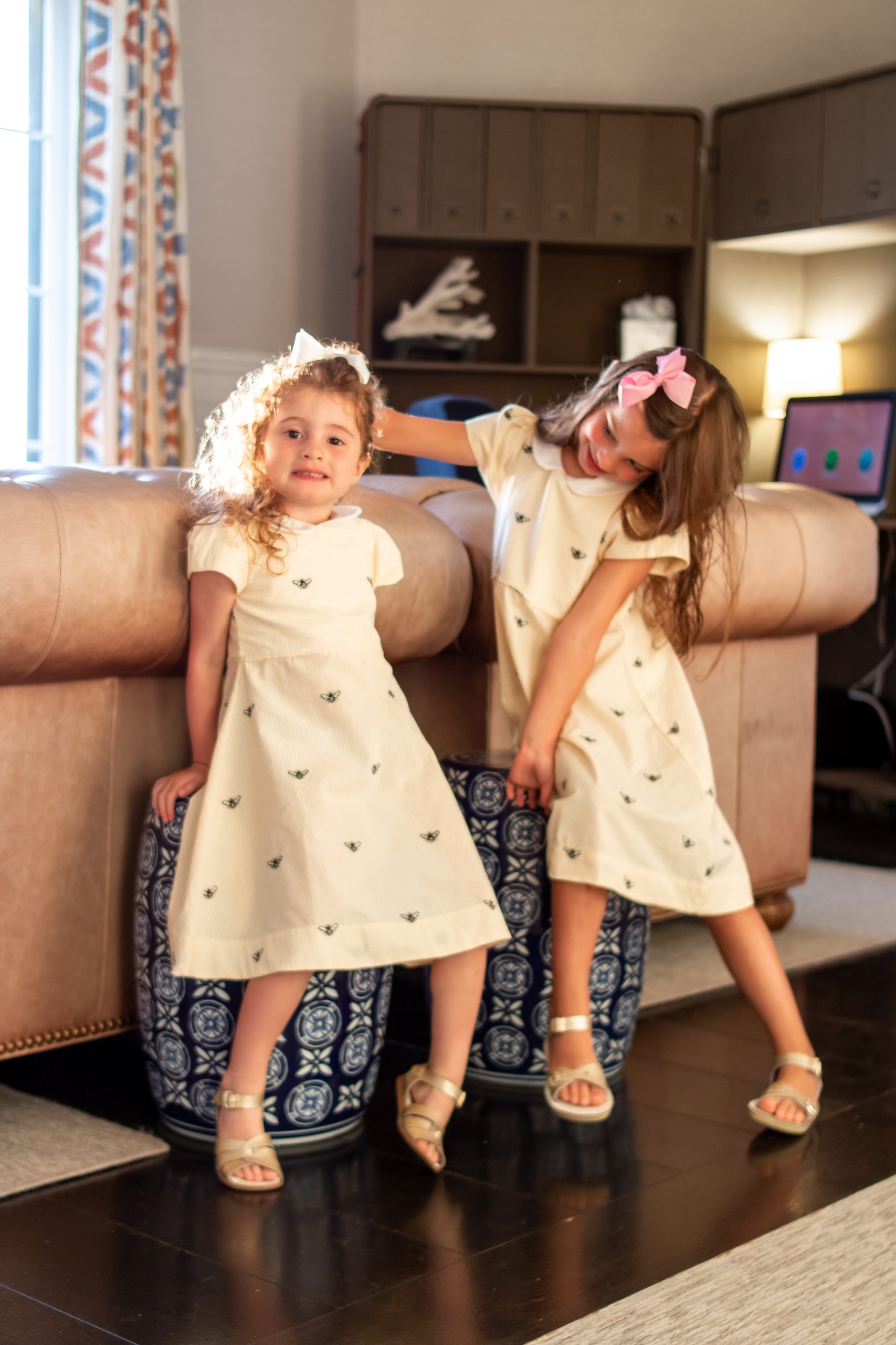 little girls in Piping Prints yellow bee dresses
