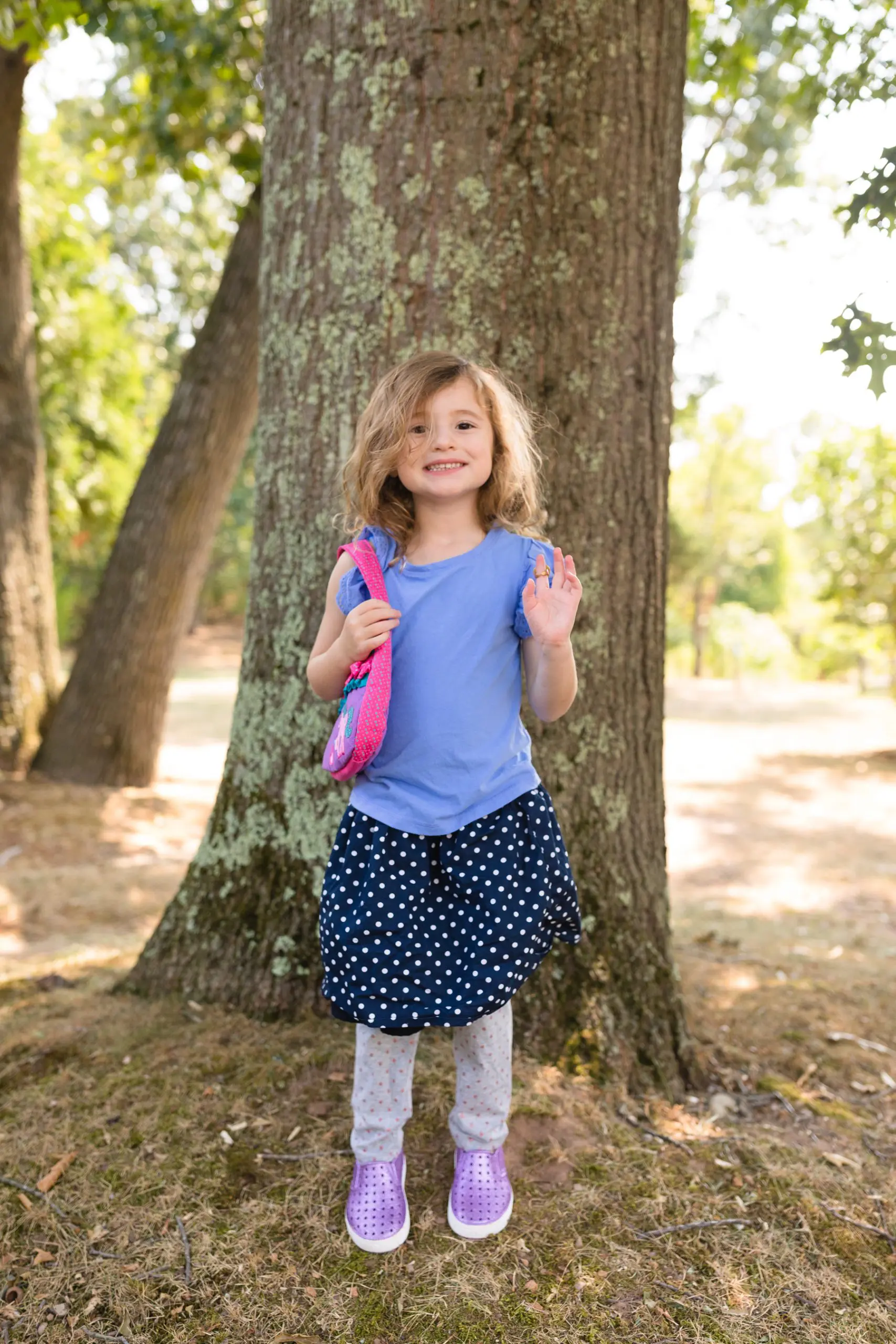 four year old in mismatched clothes