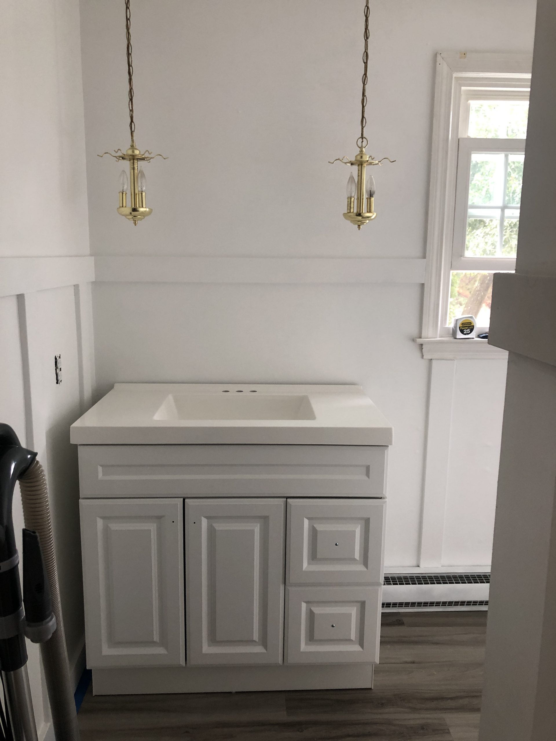 white vanity with white sink top bathroom remodel