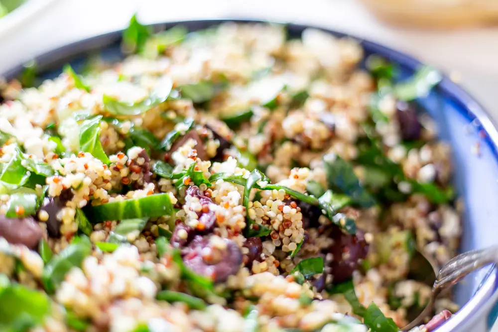 Mediterranean Quinoa Salad in Blue Bowl