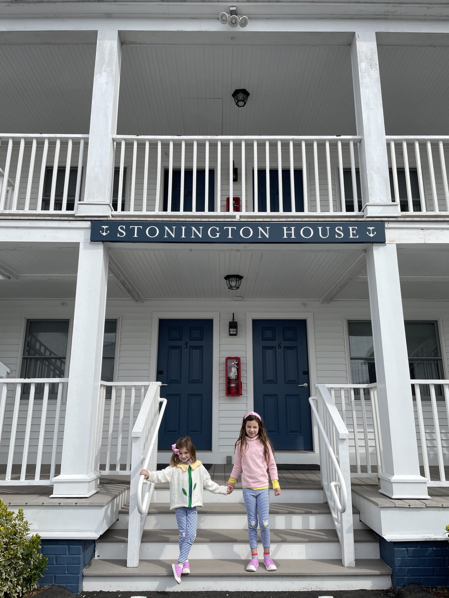 little girls outside Stonington house Whaler's Inn