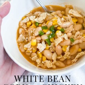 white bean corn chicken chili with dairy free sour cream and jalapeño