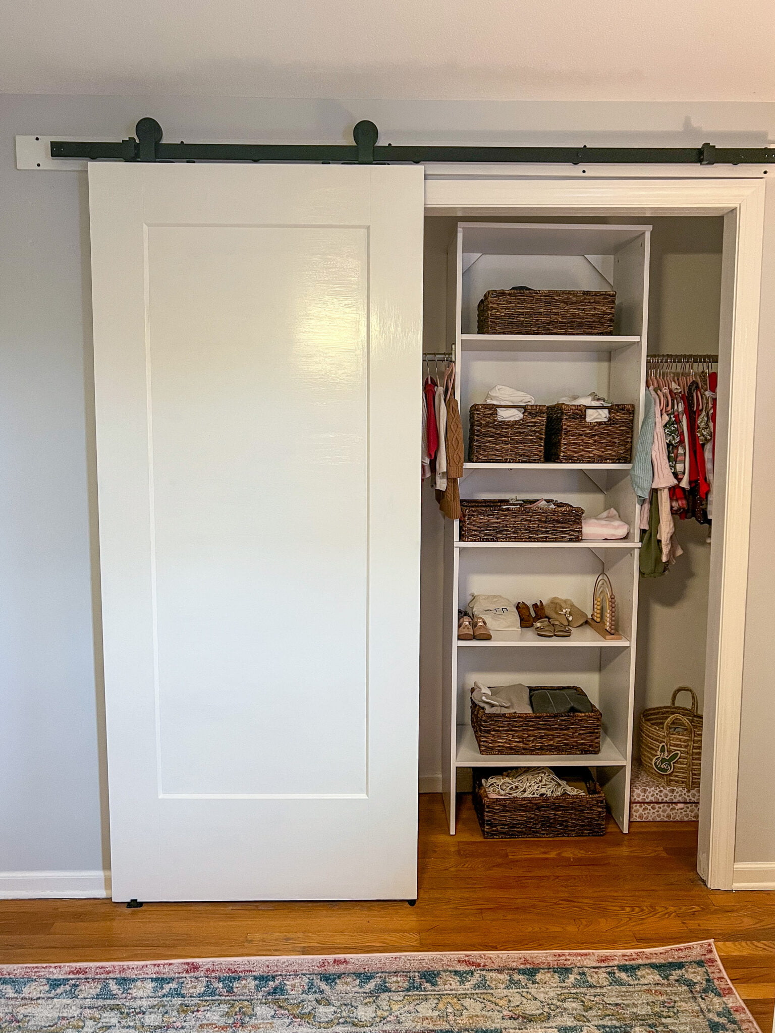 After DIY Nursery Closet Upgrade with the Masonite Barn Door Kit
