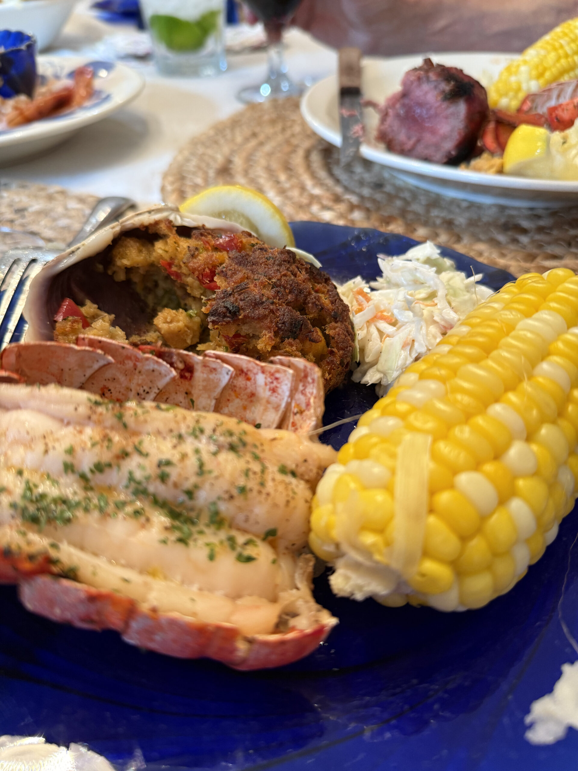 Grilled Surf-n-Turf
We always have a surf-n-turf family dinner with steak, lobster rolls, grilled shrimp, fresh fish, stuffed clams, corn on the cob, and a feta olive salad.