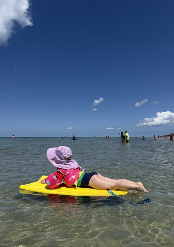 toddler floating on boogie board Mayflower Beach Cape Cod August 2025