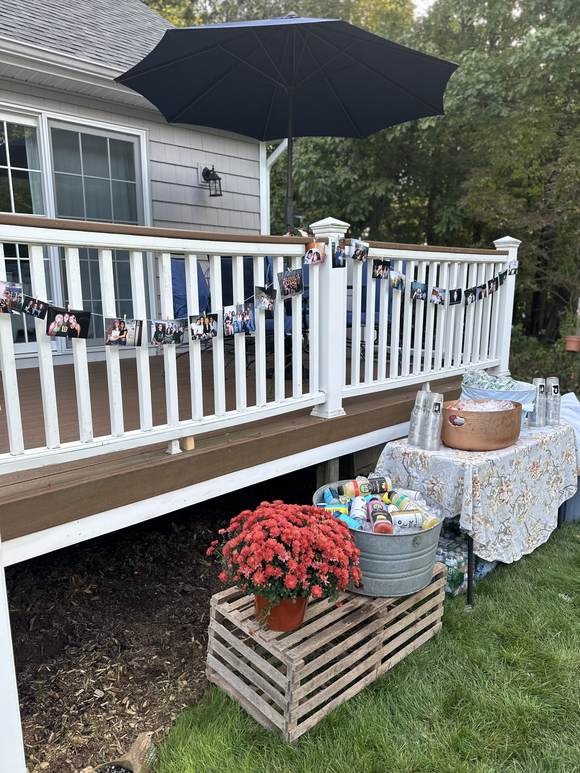 40th Backyard Party Drink Self Serve Area with photo banner lobster crate mums tin buckets of drinks