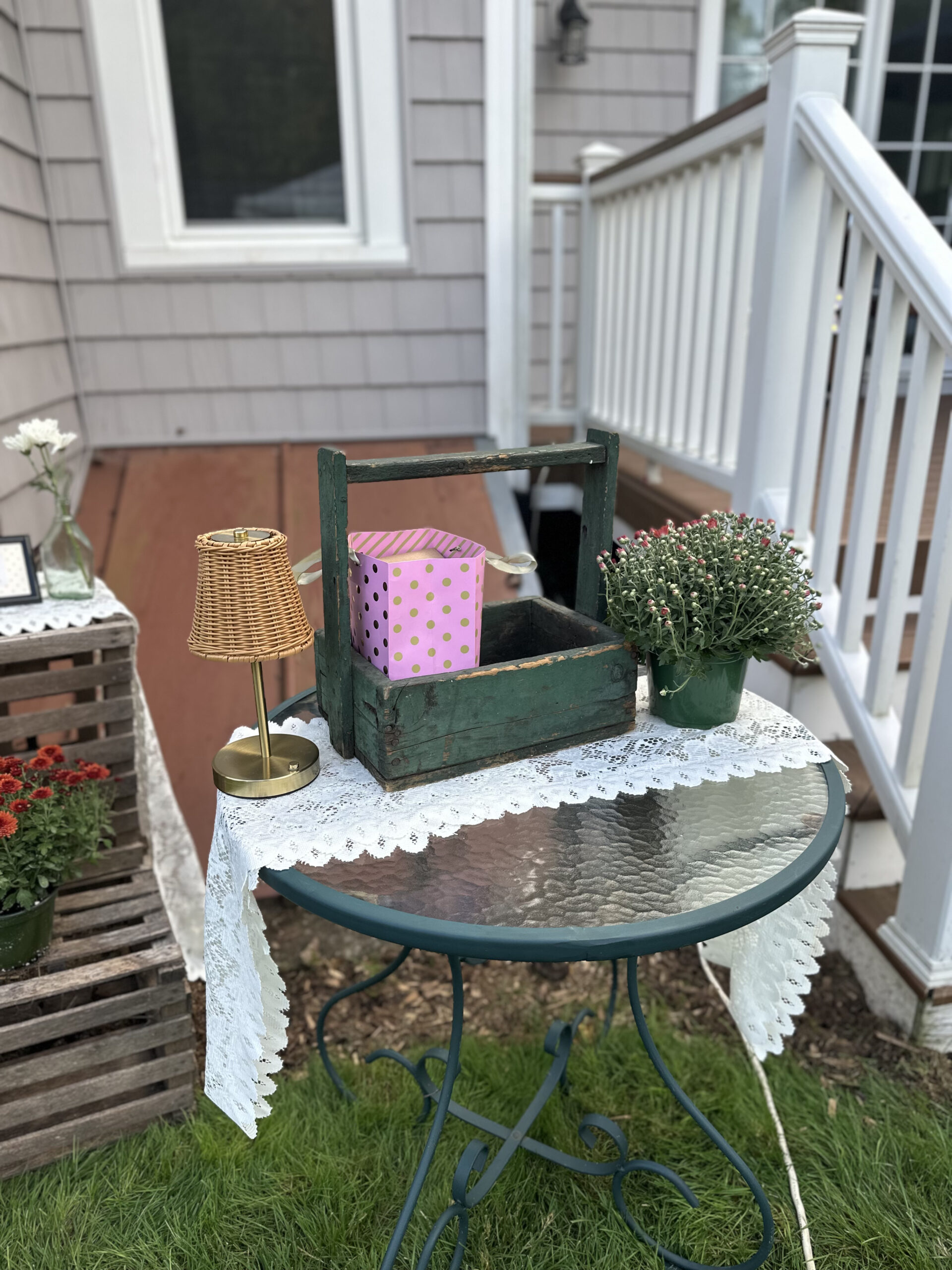 Gift table at 40th birthday party with basket for cards and fall flowers