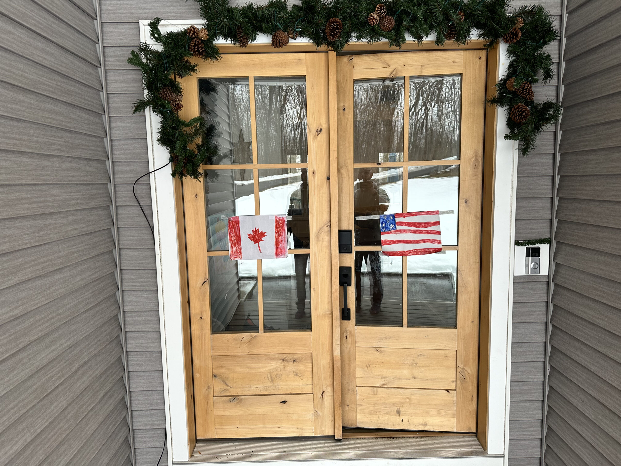 canada USA flags on door for Olympic hockey