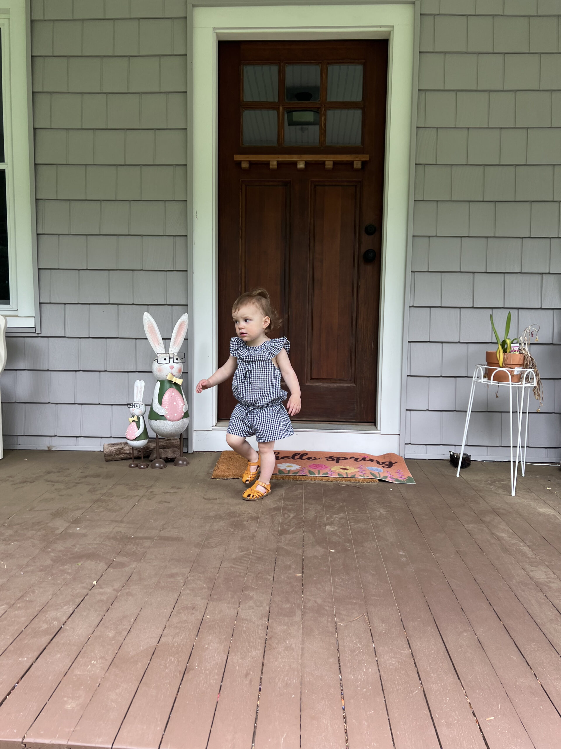 toddler walking out front door third child