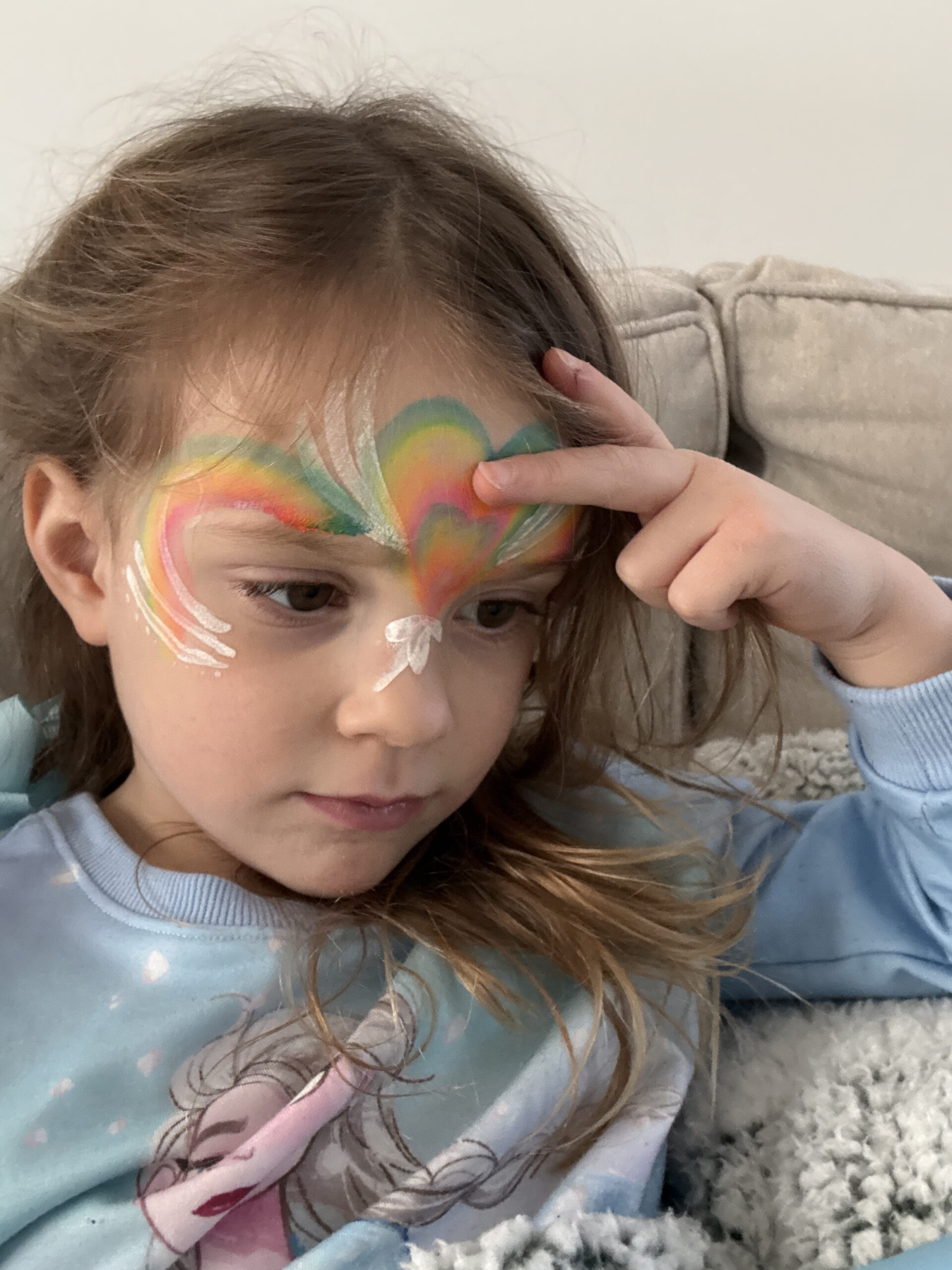 toddler with face paint