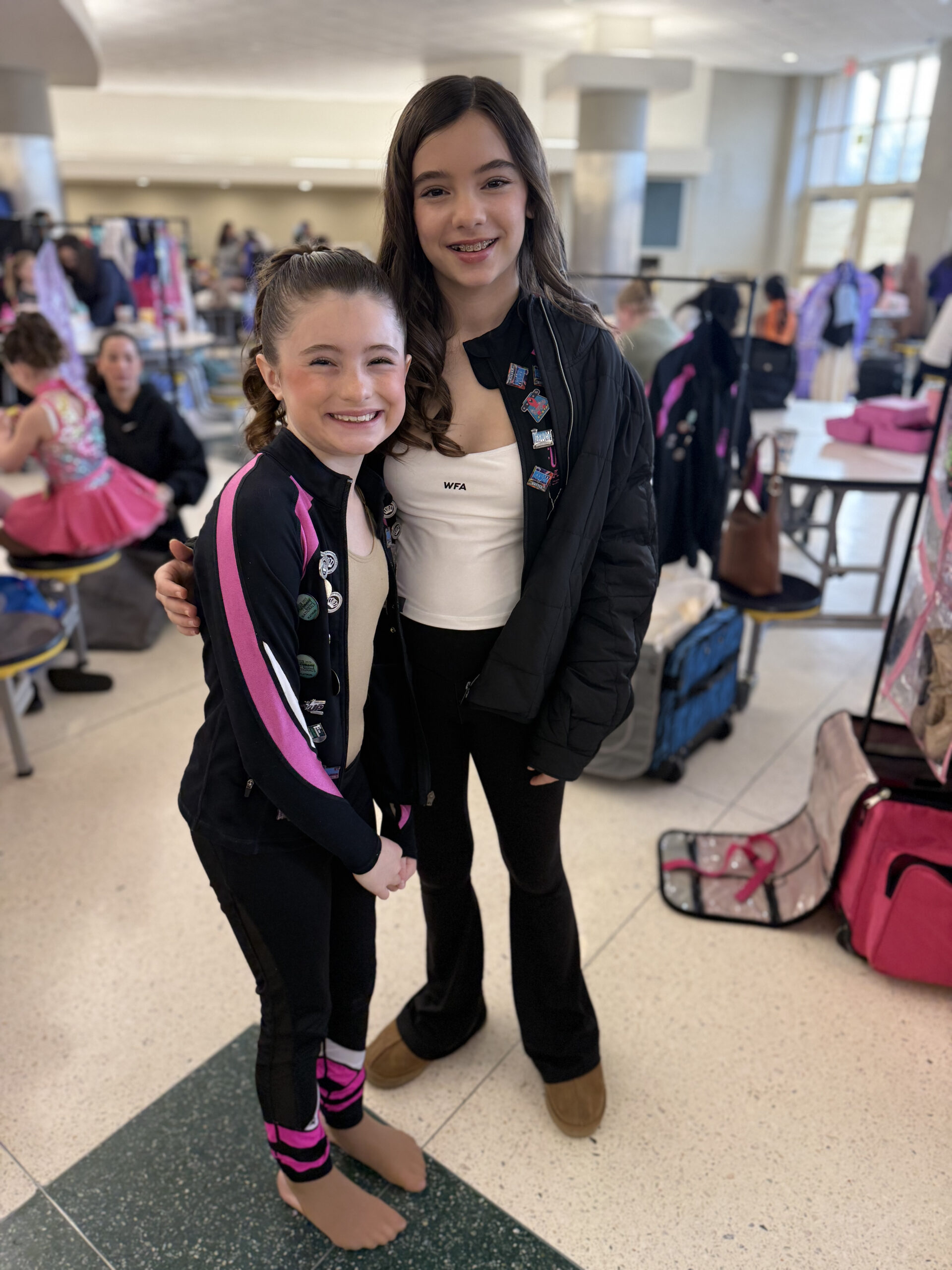 May Dance Competition sister in warm up clothes