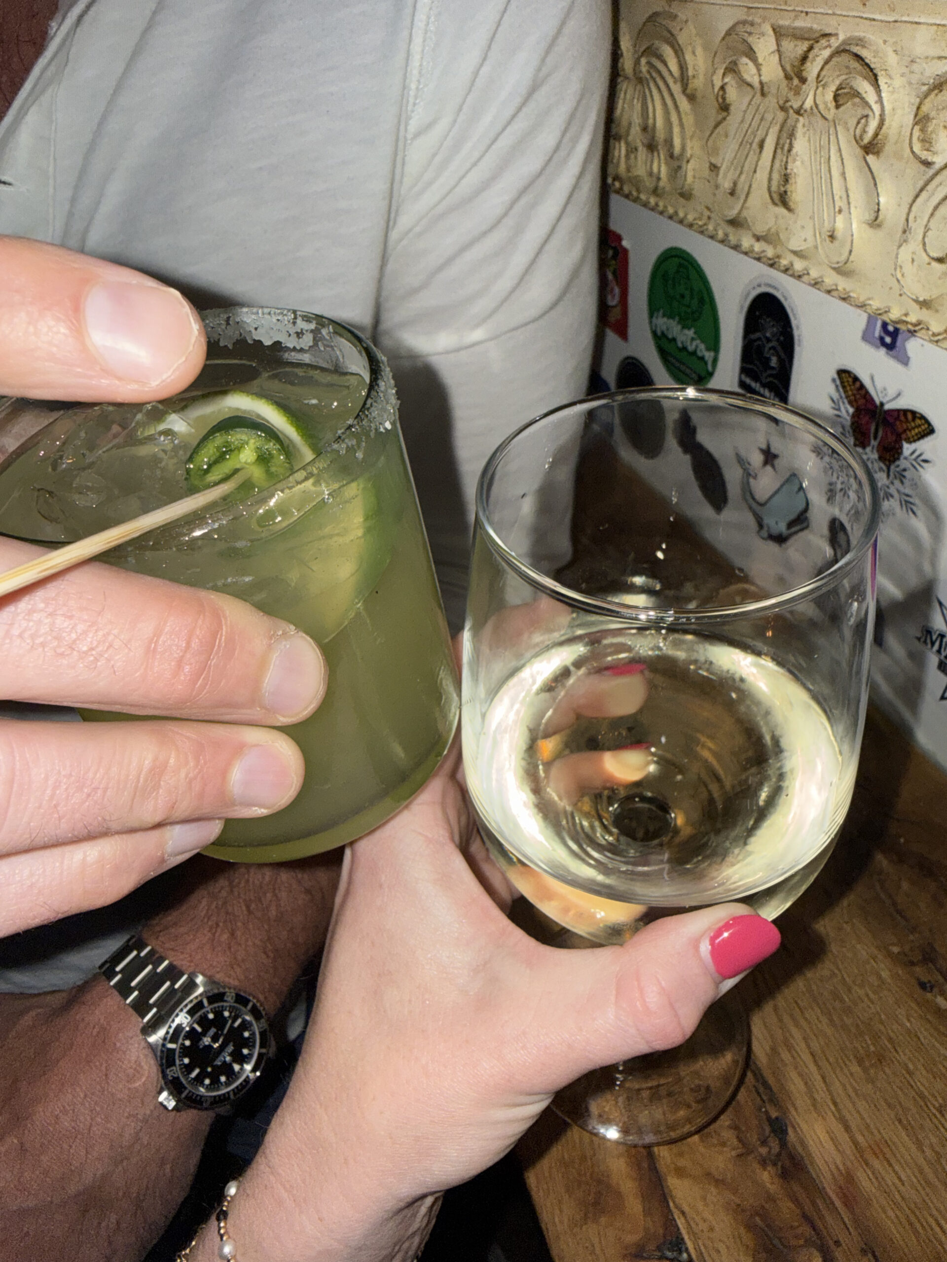 mom and dad date night cheers with drinks at Sayulitas