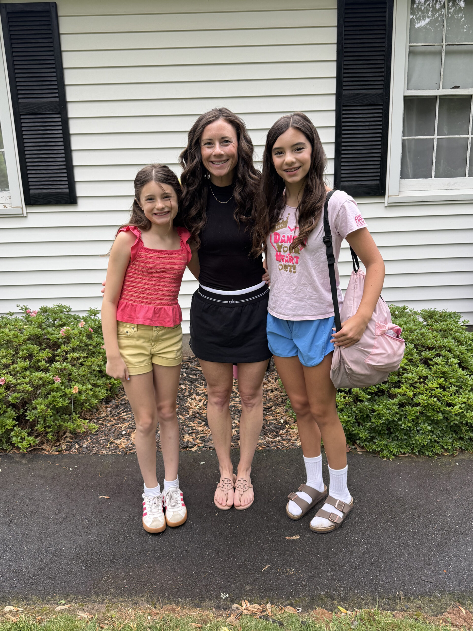 mom with daughters on Last day of school 2026 