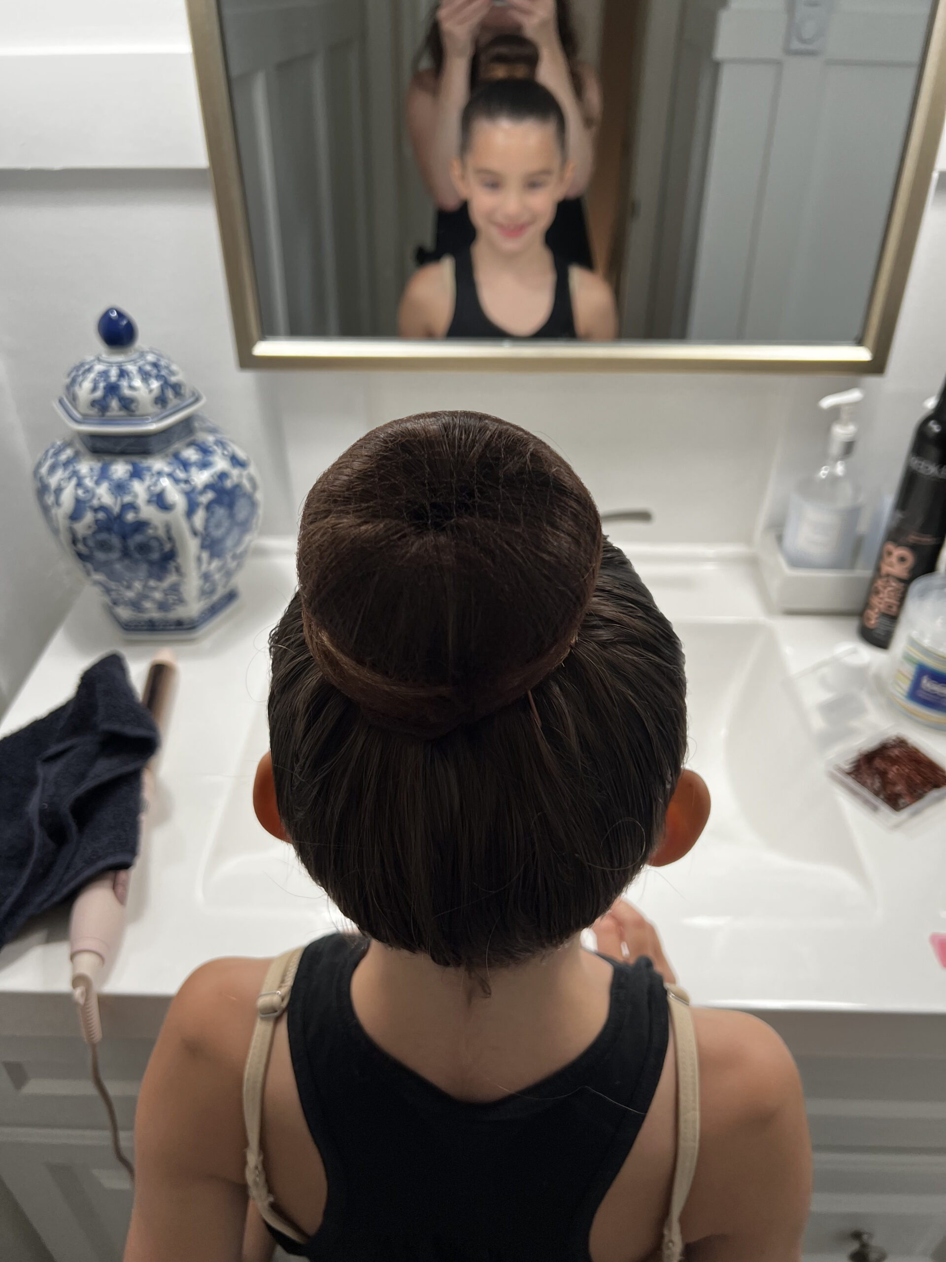 the perfect ballet bun for dance competition