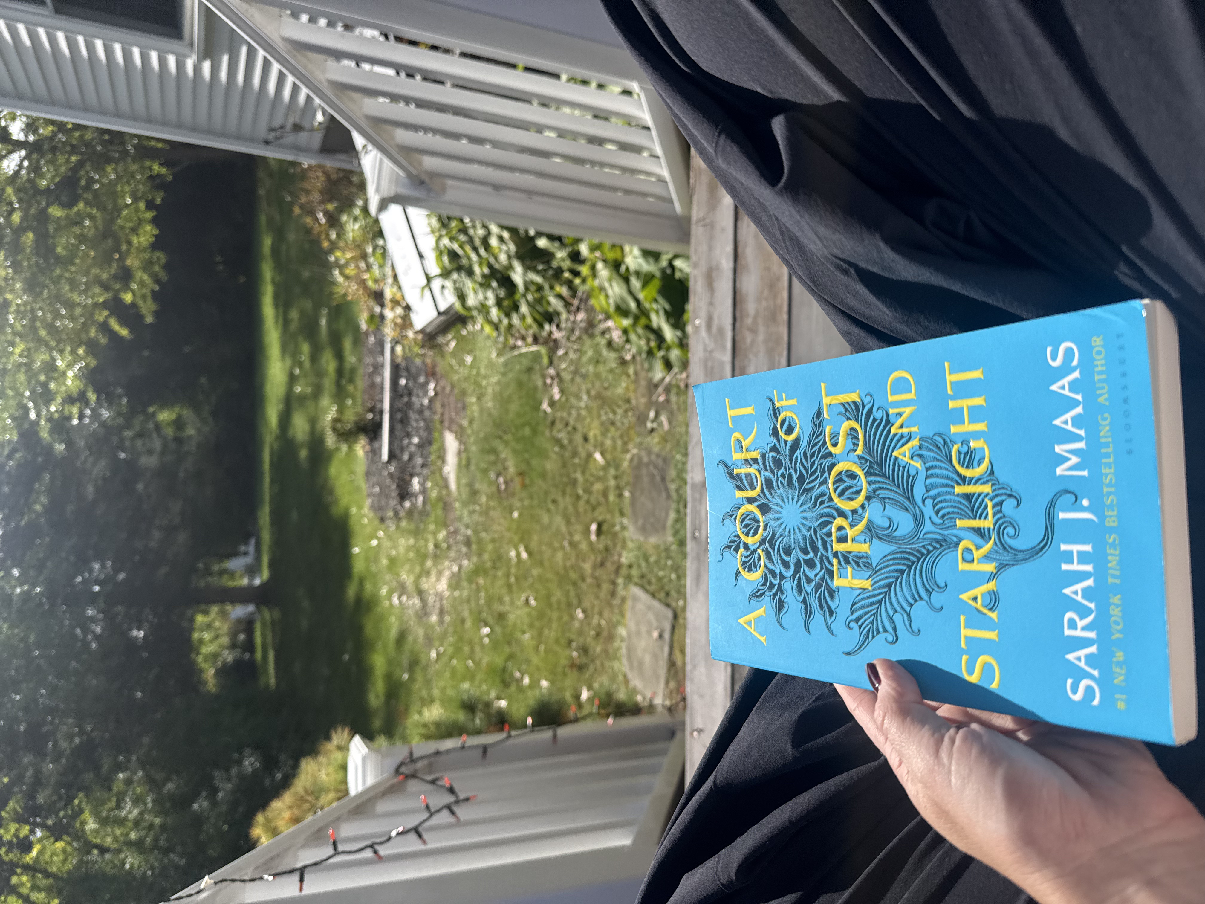 Reading A Court of Frost and Starlight outside October